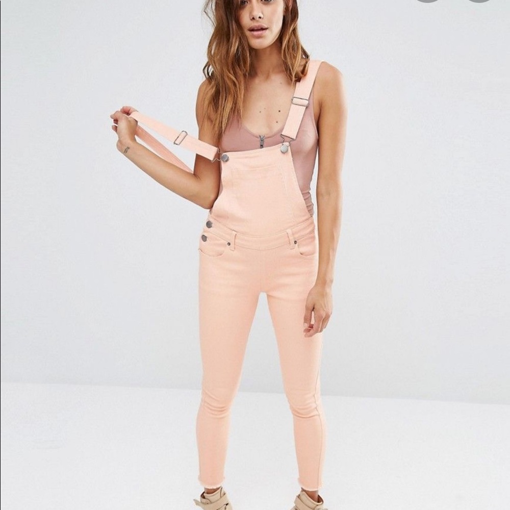 Pink denim overalls